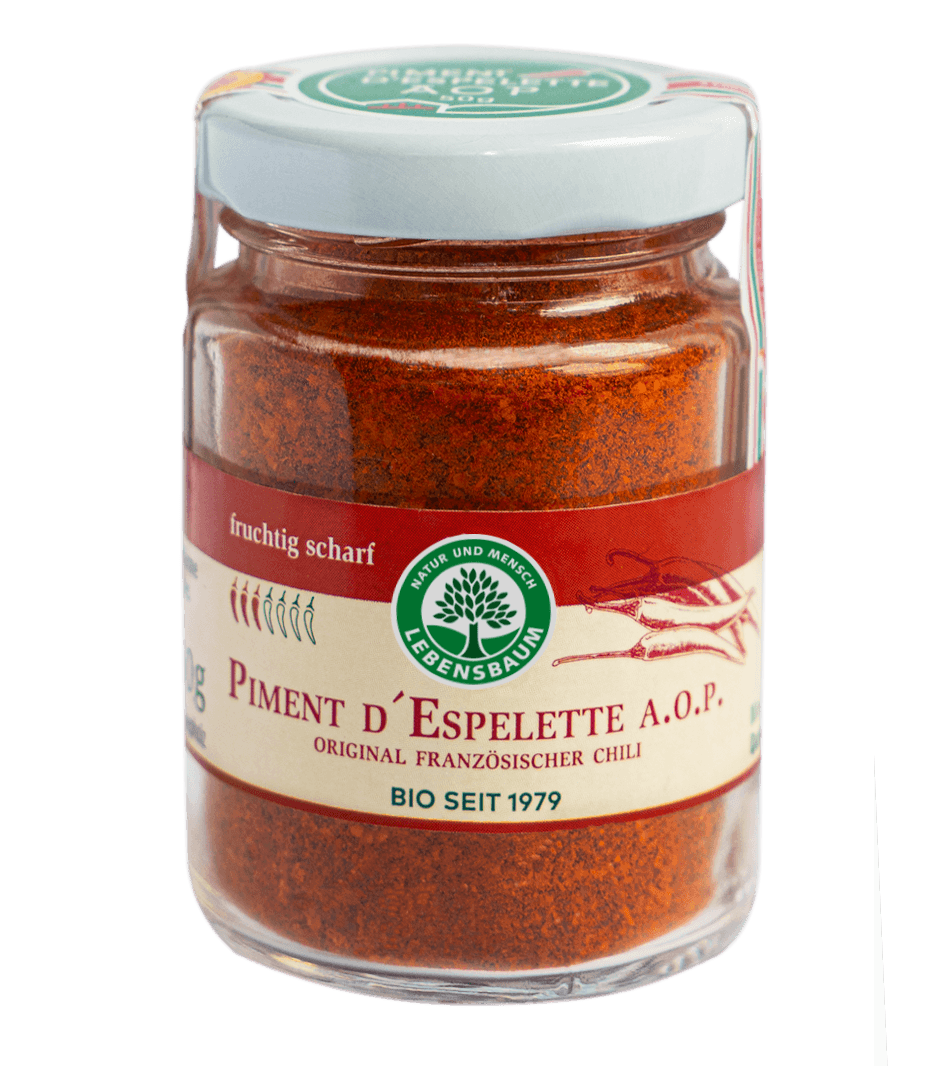 Piment d'Espelette A.O.P. Bio, feingemahlenes Chili-Pulver in Glasdose mit weißem Deckel und rotem Etikett von Lebensbaum.